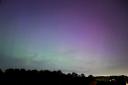 Northern Lights sweep the sky above Hampstead Heath