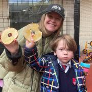 Kate Leggo and her six-year-old son Fred enjoying  hot bagel breakfast at school