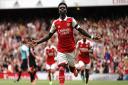 Arsenal's Bukayo Saka celebrates scoring against Sevilla in the Emirates Cup