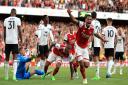 Arsenal's Gabriel, Ben White and William Saliba celebrate their winning goal against Fulham
