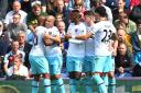 West Ham United's Sofiane Feghouli (second left) is congratulated on scoring his team's opening goal at Burnley (pic: Dave Howarth/PA Images)