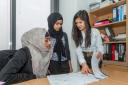 Work experience students Shabnam Akhter (left) and Nusrat Chowdhury (centre) of Central Foundation Girls' School with Hafsa Tasnim of the Canary Wharf Group.