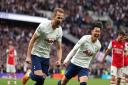 Tottenham Hotspur's Harry Kane and Heung-Min Son celebrate the first goal against Arsenal