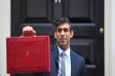 Chancellor of the Exchequer, Rishi Sunak, holds his ministerial 'Red Box' outside 11 Downing Street, London, before heading to the House of Commons to deliver his Budget.