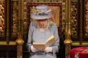 Queen Elizabeth II delivers a speech from the throne in House of Lords at the Palace of Westminster in London as she outlines the government's legislative programme for the coming session during the State Opening of Parliament.