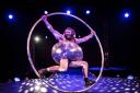 Antoine Carabinier-L�pine performs with a Cyr Wheel as part of the Barbu acrobatic troupe. Picture: David Jensen