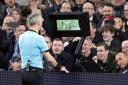 Referee Bjorn Kuipers consults VAR before awarding Manchester City a penalty during the Champions League quarter-final, first leg match at Tottenham Hotspur Stadium (pic: Adam Davy/PA Images).