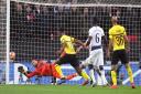 Tottenham Hotspur goalkeeper Hugo Lloris makes a save from Borussia Dortmund's Dan-Axel Zagadou during the UEFA Champions League round of 16, first leg match at Wembley Stadium (pic: Adam Davy/PA Images).