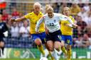 England's Kelly Smith (right) battles with Sweden's Caroline Seger