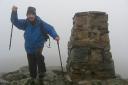 Garry Kennard at the peak of Moel Siabod, Snowdonia, Wales.