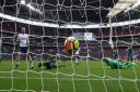 Tottenham Hotspur's Harry Kane (left) scores his side's second goal against Southampton (pic Steven Paston/PA)