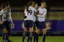 Tottenham Hotspur Ladies' Lauren Pickett (centre) is congratulated by her team-mates after scoring against Chelsea (pic: wusphotography.com).