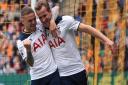 Tottenham Hotspur's Harry Kane (right) celebrates scoring his side's second goal against Hull City (pic: Danny Lawson/PA Images)