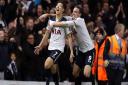 Heung-Min Son (left) celebrates with Vincent Janssen after scoring Tottenham's late winning goal. Picture: PA