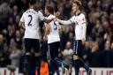 Christian Eriksen (right) celebrates with Kyle Walker after scoring his second goal against Hull