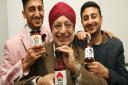 Father Hardev Singh with Kuldip, left, and other son Sukhi show off  their Mr Singh's spicy sauces.