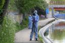 Forensics at Grand Union Canal in Willesden where a baby's body was found