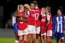 Arsenal's Beth Mead interacts with Brighton's Victoria Williams after the Women's Super League match at Meadow Park