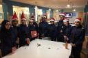 Police cadets at Stoke Newington station wrap up the presents