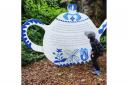 Leonardo Franco, 5, looks at a giant teapot at The Museum of Childhood