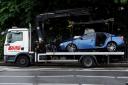 The wrechage of a car that crashed with a bus is put onto a tow truck
Photo: David Mirzoeff