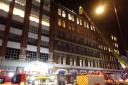 Firefighters tackle a blaze at a restaurant in Shoreditch High Street, believed to have been caused by grease in the extractor system catching fire