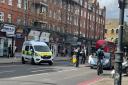 Police at Stoke Newington High Street after a shooting