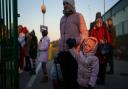 A family from Ukraine cross the border point from Ukraine into Medyka, Poland on March 19