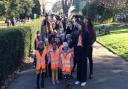 St Mary School students walking with Kelly-Marie in Stoke Newington