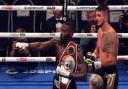 Lawrence Okolie (left) celebrates after retaining the WBO World Cruiserweight title belt after defeating Dilan Prasovic via Round 3 knockout at the Tottenham Hotspur Stadium.