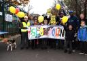 Pupils, staff, parents and a councillor protest outside Sir Thomas Abney over dangerous driving. Picture: Polly Hancock