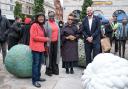 Diane Abbott MP, Cllr Carole Williams, artist Veronica Ryan and mayor of Hackney Philip Glanville with the custard apple, breadfruit and soursop sculptures