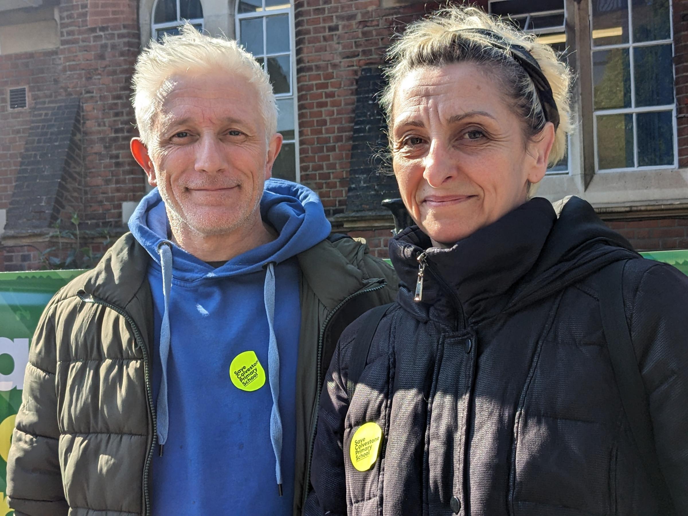Parents Corine and Brandon Bishop at Colvestone primary school , Hackney. Their child has special needs Because of falling school rolls Colvestone primary could merge wih Princess May School Pic Julia Gregory, free for use by partners of BBC news 