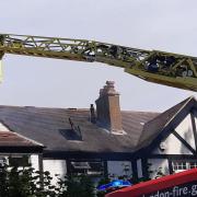 A fire gutted the roof of a house on Queen Elizabeth's Walk, near Clissold Park, this afternoon