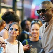 Idris Elba signing a autograph at a special screening of Beast at the Hackney Picturehouse. Picture date: Wednesday August 24, 2022