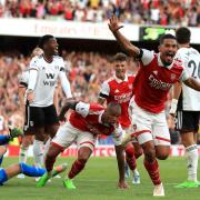Arsenal's Gabriel, Ben White and William Saliba celebrate their winning goal against Fulham