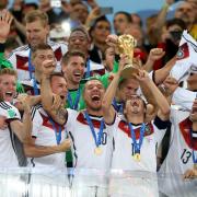 Germany's Philipp Lahm lifts the World Cup trophy in 2014. Photo: PA  / Mike Egerton