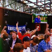 Hackney football fans celebrate in BOXPARK Shoreditch during EURO 2020.