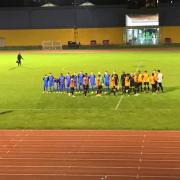 Tower Hamlets and Leyton Orient youth teams shake hands before the match (Pic: Jacob Ranson)