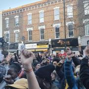 Protesters blocked off Stoke Newington High Street calling for justice and action after a Black child was strip searched at school
