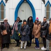 Patricia, Janet, Kerry, Sharon, Reverend Daley, Tiffany, Dalian and Sandra photographed outside the Sight of Eternal Life Church in Shrubland Road