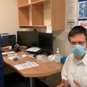 Dr Opat, from Cranwich Road Surgery in Stamford Hill, receiving a vaccine administered by Dr Cerian Choi.