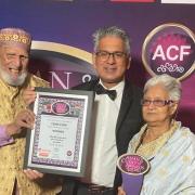 Owner of YumYum Thai Restaurant in Stoke Newington, Atique Choudhury with his parents Khaleda and Dabirul Choudhury at The Asian Curry Awards