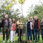 The walking team in Hackney Downs beside a tree planted in Ann's memory.
