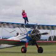 Super gran Elana Overs strapped in for her charity wing walk.