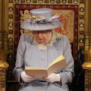 Queen Elizabeth II delivers a speech from the throne in House of Lords at the Palace of Westminster in London as she outlines the government's legislative programme for the coming session during the State Opening of Parliament.