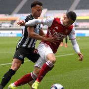 Newcastle United's Jacob Murphy (left) and Arsenal's Gabriel Martinelli battle for the ball during the Premier League match at St James' Park, Newcastle upon Tyne. Issue date: Sunday May 2, 2021.