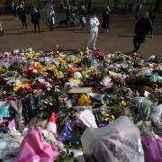 Floral tributes left at the band stand in Clapham Common, London, for murdered Sarah Everard. Serving police constable Wayne Couzens, 48, appeared in court on Saturday charged with kidnapping and murdering the 33-year-old marketing executive, who went