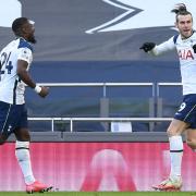Tottenham Hotspur's Gareth Bale (right) celebrates scoring their side's fourth goal of the game during the Premier League match at the Tottenham Hotspur Stadium, London.