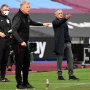 Tottenham Hotspur manager Jose Mourinho (right) gestures on the touchline during the Premier League match at the London Stadium, London. Picture date: Sunday February 21, 2021.